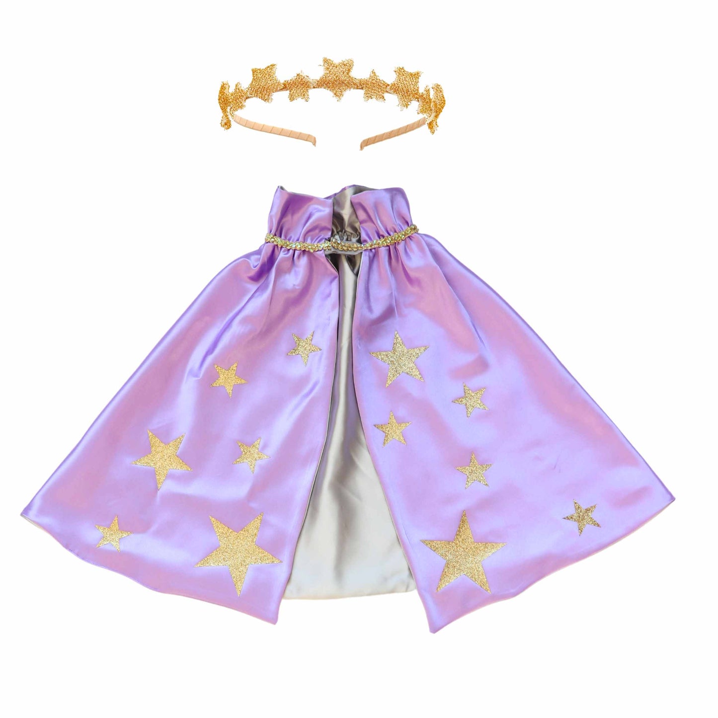 a purple cape with gold stars on it