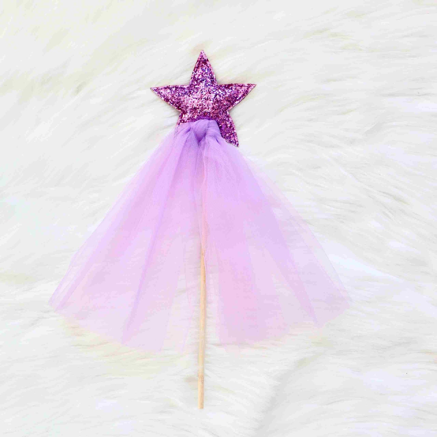 a purple dress with a pink star on it